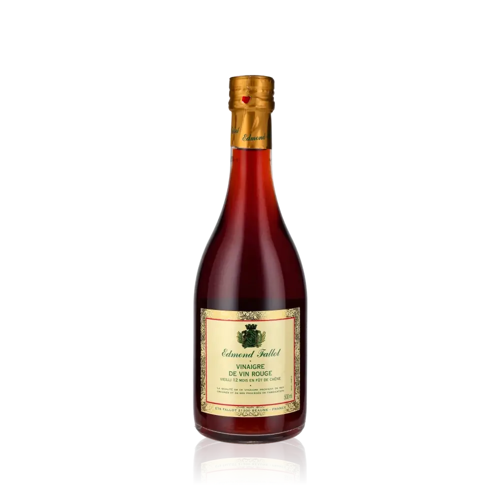 Edmond Fallot Rotweinessig Flasche vor schwarzem Hintergrund.