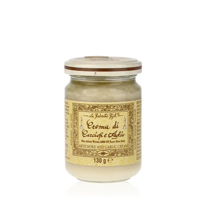 Glas mit Favorita Crema di Carciofi e Aglio Aufstrich.