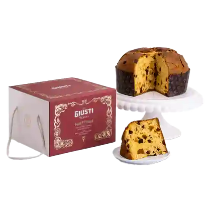 Giusti Panettone mit Aceto Balsamico di Modena mit Verpackung und ohne auf einem Tortenständer