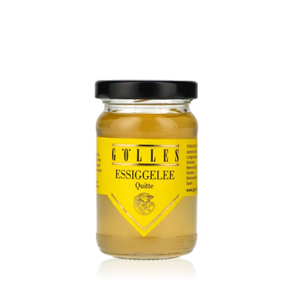 Gölles Essiggelee Quitte im Glas mit gelbem Etikett.