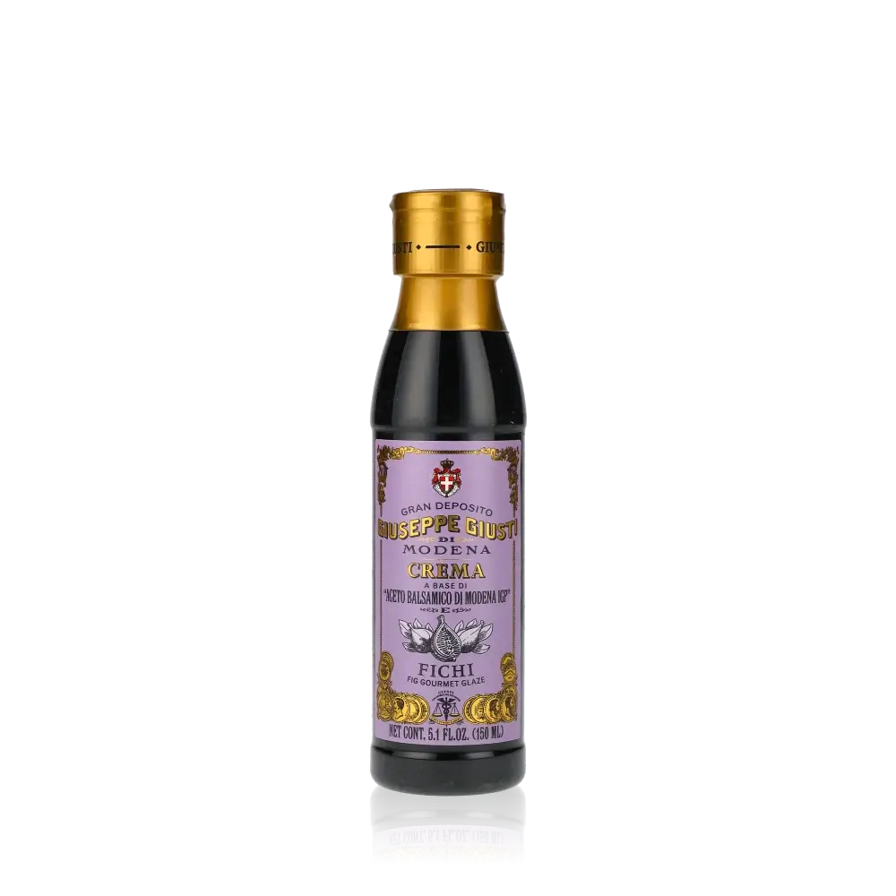 Giuseppe Giusti Crema Fichi Balsamicocreme Flasche vor schwarzem Hintergrund.