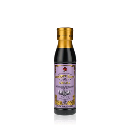Giuseppe Giusti Crema Fichi Balsamicocreme Flasche vor schwarzem Hintergrund.