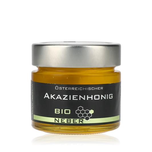 Glas Akazienhonig mit Etikett.