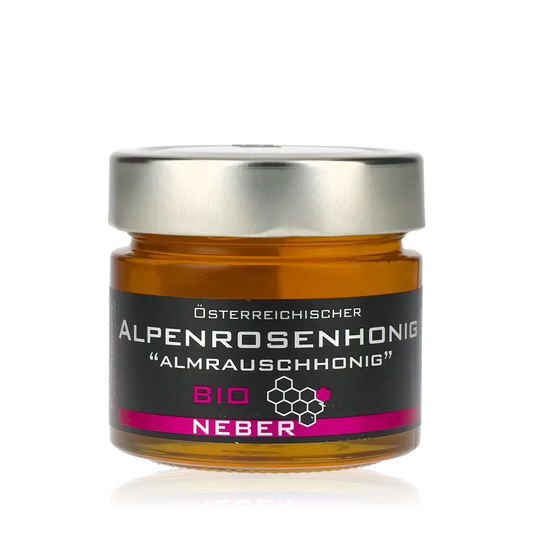 Glas Alpenrosenhonig mit Etikett.