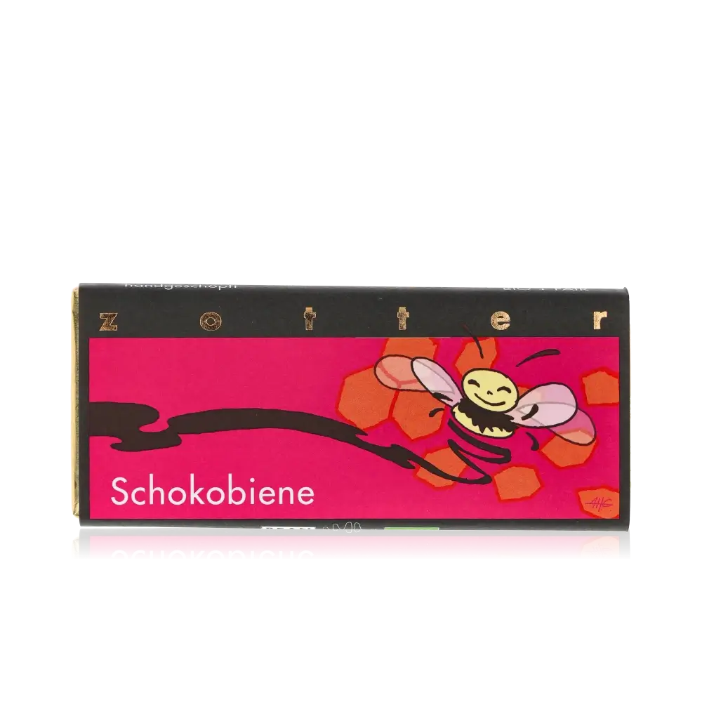Zotter Schokolade, Schokobiene, bunte Verpackung, schwarze Hintergrund.