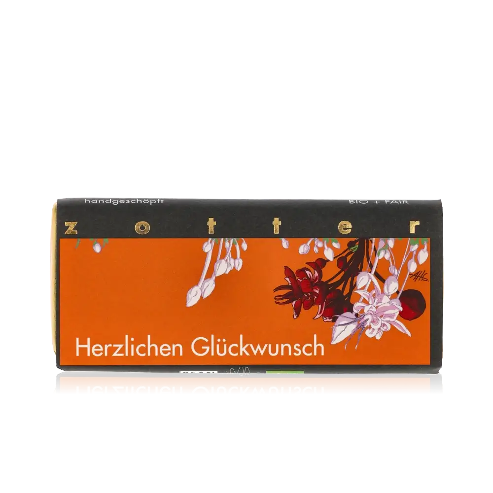 Zotter Schokolade mit "Herzlichen Glückwunsch" Aufschrift, Blumenmotiv.