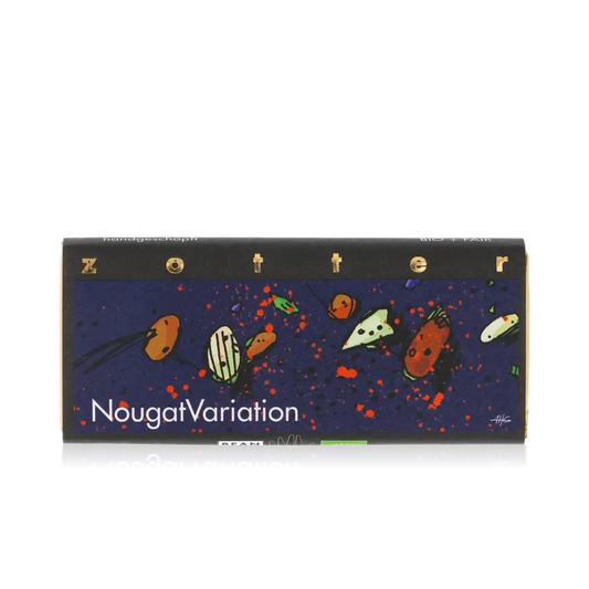 Zotter Schokolade NougatVariation Verpackung mit buntem Design.