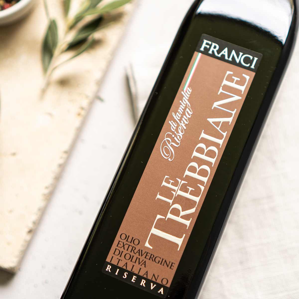 Olivenölflasche Frantoio Franci Le Trebbiane Etikett.