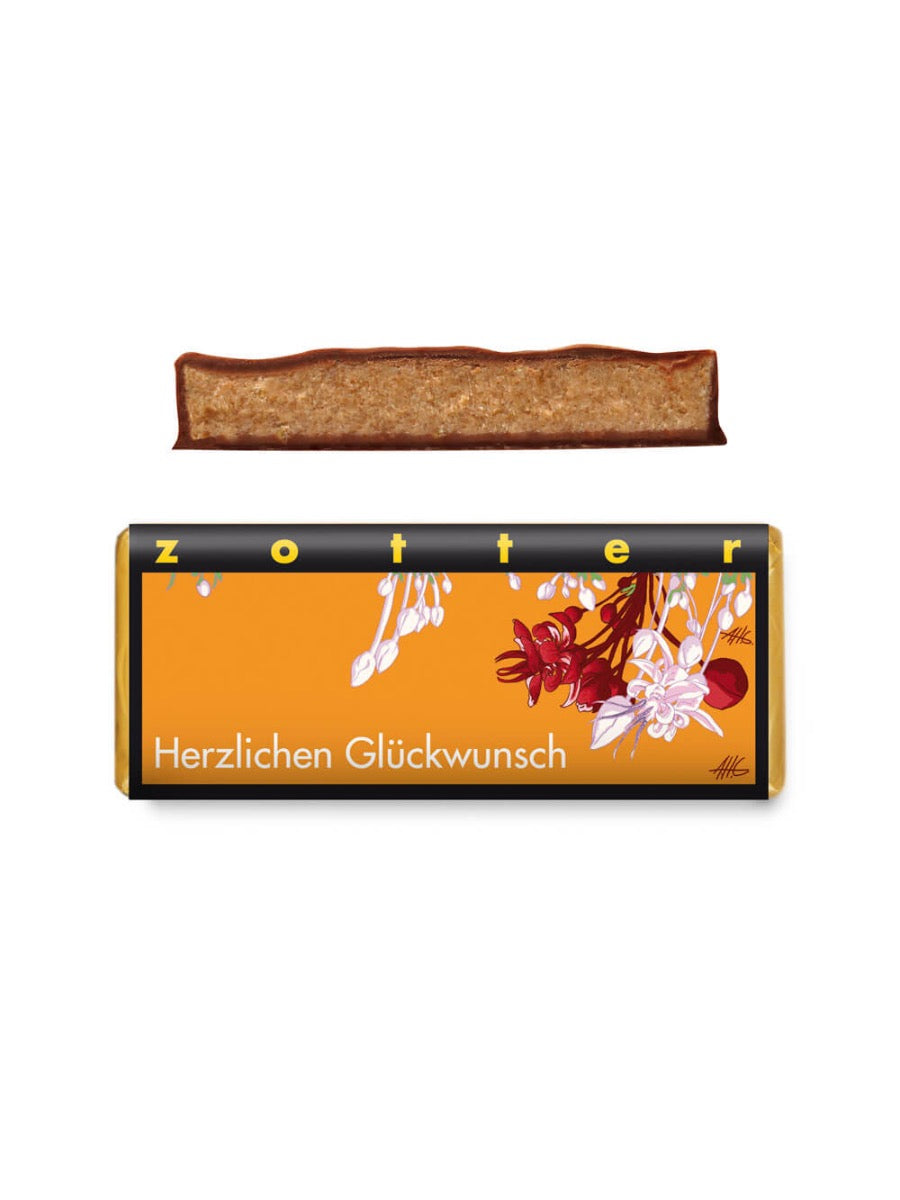 Zotter Schokolade mit Nougatfüllung und "Herzlichen Glückwunsch" Aufschrift.